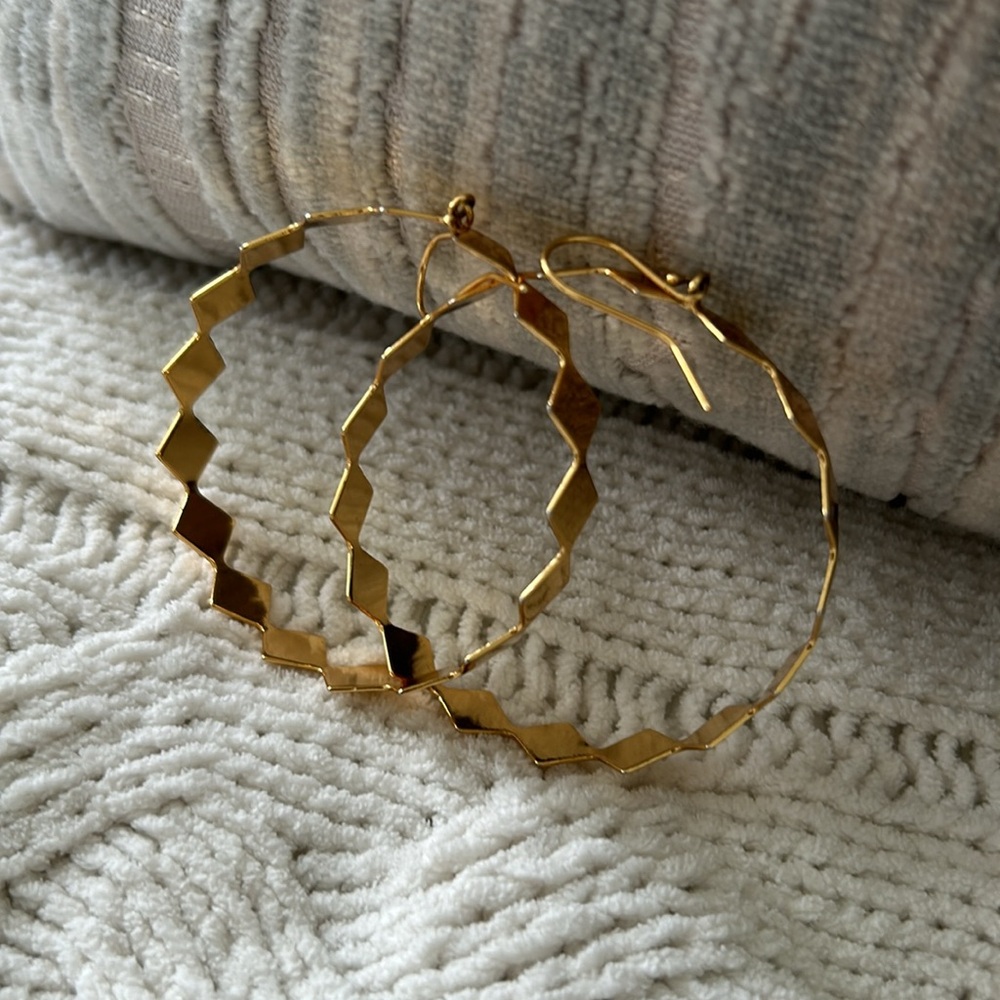Oversized high shine gold hoop earrings
